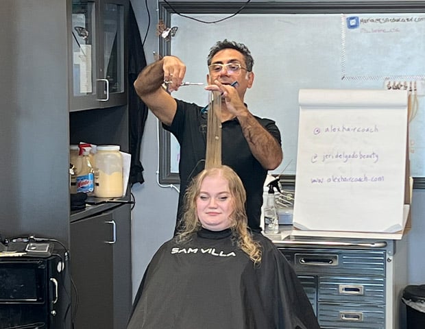 Beauty Instructor Beauty-Instructor Training - a man cutting a woman's hair