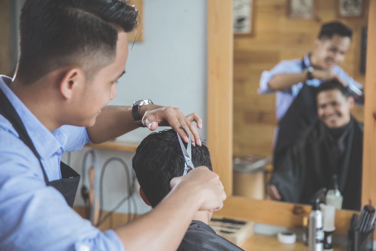 Barber cutting hair