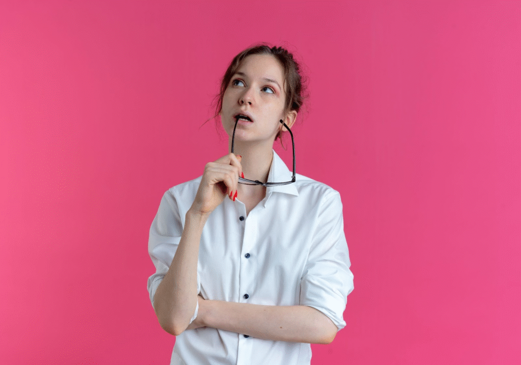 Cosmetologist vs. Esthetician vs. Barber: Choosing the Right Beauty Career Path 6 Young student thinking about choosing cosmetology, esthetics or barbering career