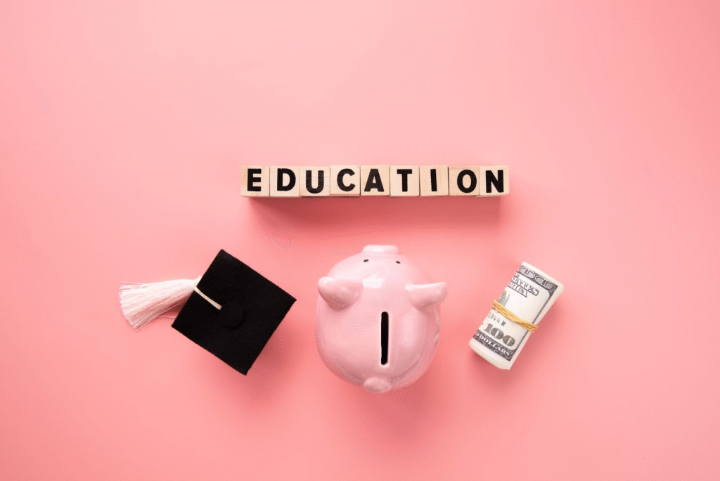 Pink piggy bank with graduation cap and cash symbolizing financial planning for cosmetology school.