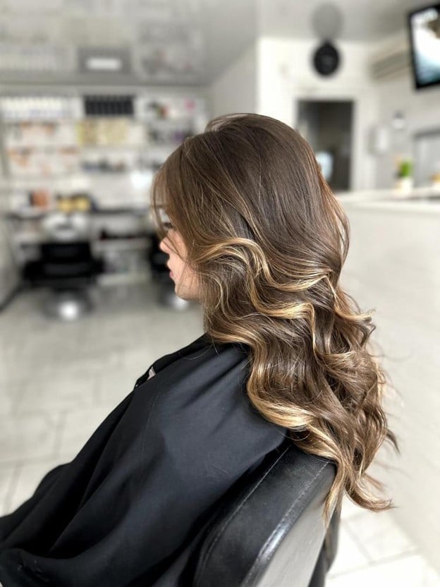 Top 3 Ways to Do Ombre Hair: A Guide for Aspiring Hairstylists 2 Completed ombre hair color styled by cosmetology student during salon training at Cosmetology & Spa Academy hair styling school in Illinois.
