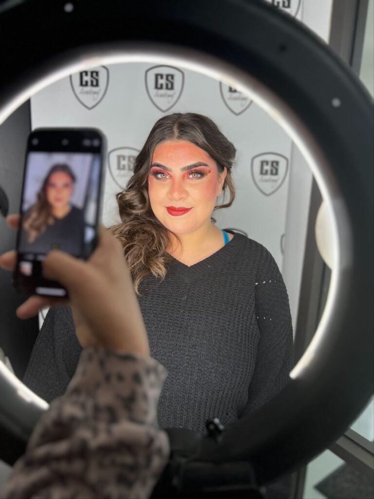 From Chair to Owner: How to Open Your Own Salon in Illinois 3 Person posing for a photo shoot.