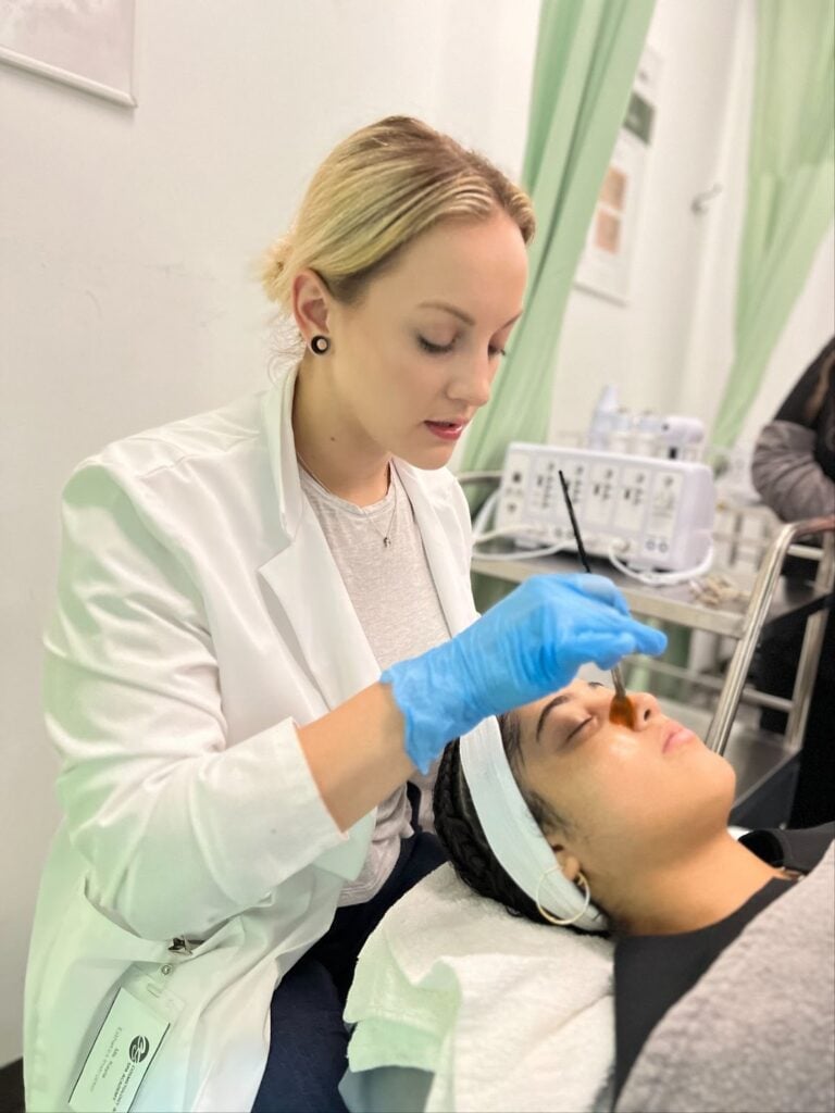 Advanced Facial Treatments Every Esthetician Should Master 2 Person receiving a skincare treatment.
