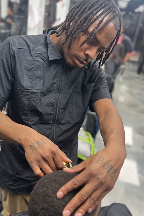 Student in Barber School doing Barber Training in CSA Academy Illinois