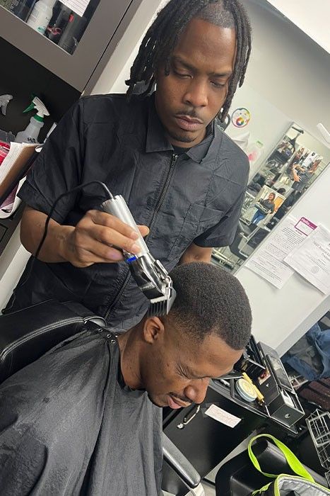 Student in Barber School doing Barber Training in CSA Academy Illinois
