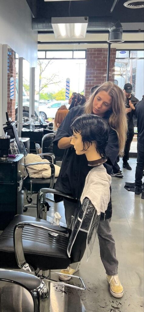 Top Summer Hairstyles - What Clients Actually Keep Asking For in 2026 3 student practicing hair cutting techniques at Cosmetology & Spa Academy, one of the best cosmetology schools in Illinois